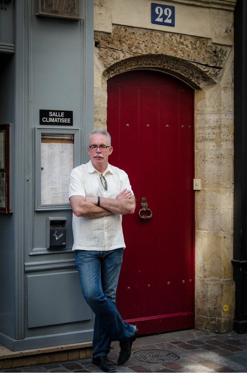 Tim O'Brien at the entrance to the Palais des Papes, Avignon