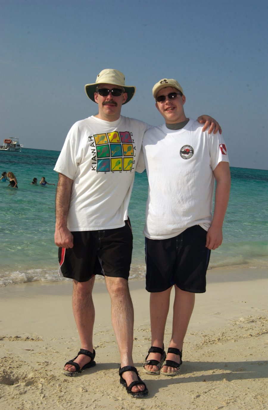 Tim O'Brien and Timothy James O'Brien Jr. on the beach, Turks and Caicos